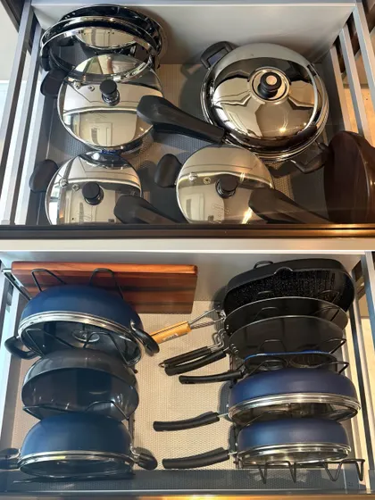 No more noisy, cluttered pot drawers. We use smart vertical stacking solutions to protect your cookware and make every pot, pan, and lid easy to grab, transforming a daily frustration into a moment of ease.