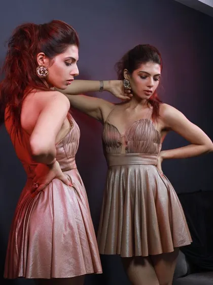 A brand shoot for Elviraa Official, featuring a golden ruched mini dress. I styled this look to feel luxurious and confident, perfect for an evening party. The mirror shot adds a dynamic and reflective element.