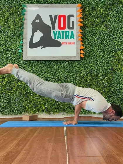 Another one of my dedicated students holding a perfect Mayurasana (Peacock Pose). This arm balance requires immense core and wrist strength, and his focus is incredible to watch.