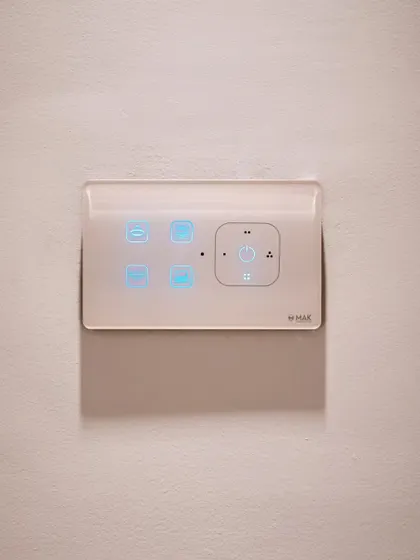 A clean, white smart panel with blue icons, offering a minimalist and modern look. This design is perfect for contemporary homes.