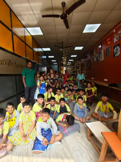 A group photo of the students from Gopal's Garden School after a successful and fun-filled pottery workshop at our academy.