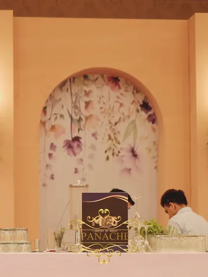 A detail of the bar backdrop, featuring a beautiful watercolor floral print.