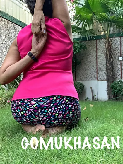 This is Gomukhasan, or Cow Face Pose, focusing on the arm bind. It's an intense and effective stretch for opening tight shoulders and improving posture.