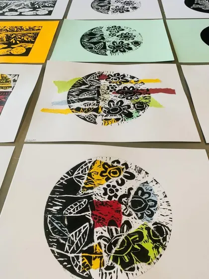 These finished prints show a creative use of the woodcut technique combined with chine-collé, where colored paper is added during the printing process. This adds pops of color and another layer of complexity to the artwork.