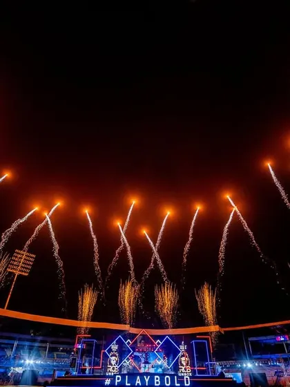 A massive display of fireworks lights up the night sky during the RCB Unbox event. We specialize in creating these high-impact moments that become the signature of a major sporting celebration.