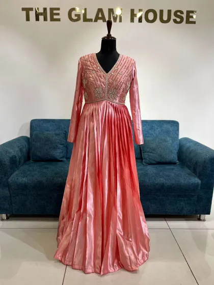 The full view of the stunning peach-pink ombre gown, a perfect blend of modern design and classic elegance.
