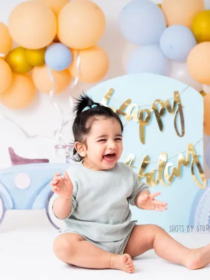 The purest laughter is always the best. This little one's joyous giggle during his first birthday shoot was absolutely infectious. Capturing these unfiltered moments of happiness is my specialty.