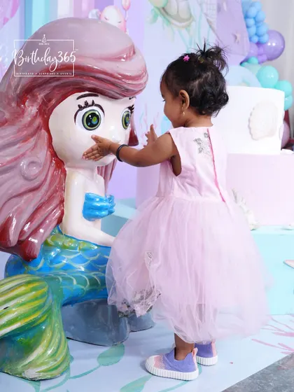 A truly magical moment as a little one gives our life-sized Little Mermaid prop a gentle touch. These are the interactions that make our parties so special.