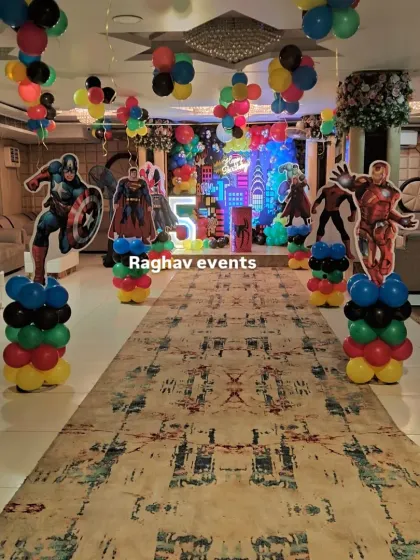 An action-packed superhero entrance for a 5th birthday party. I set up balloon columns with cutouts of Captain America, Superman, Iron Man, and Spiderman to welcome the guests.
