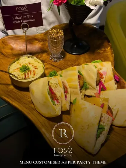 A shot from a recent house party we catered, featuring our Falafel in Pita with Hummus. We can scale our services for intimate gatherings while maintaining our signature luxury and quality.