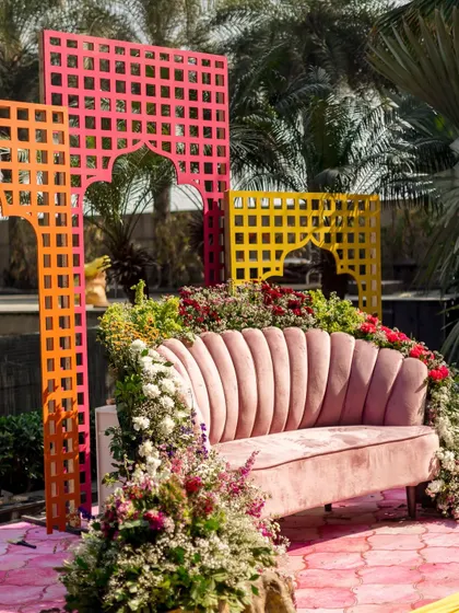Another view of the pink sofa and colorful screens, showing how I layer different elements to create a rich, textured look.