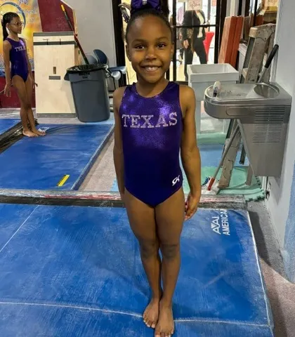 This Level 3 gymnast is all smiles at the South State Championships.