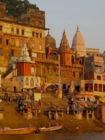 The ancient and beautiful architecture of the Varanasi ghats at sunrise. This city is a journey into the heart of spirituality.