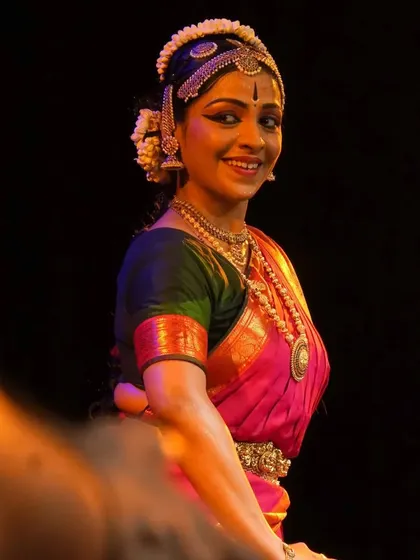 A close-up of Chaitra Rao, her expression filled with the emotion of the story she is telling. The connection between the dancer and the audience is forged in these moments.