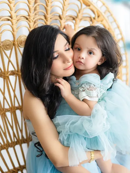 A tender embrace between a mother and her daughter. These are the quiet, heartfelt moments that become the most treasured photographs.