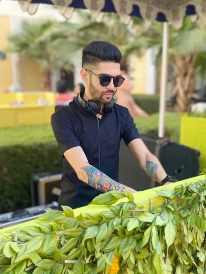 Another angle from a daytime garden party. My setup is compact and adaptable, allowing me to fit into any decor scheme without being intrusive.