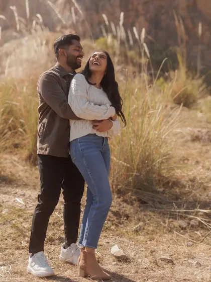 There's something magical about the soft winter light in Dilli. This is from a relaxed engagement session in a rustic field, where all I had to do was capture their natural laughter. My goal is for you to forget the camera is even there, so your real personalities can shine through in your couple portraits.