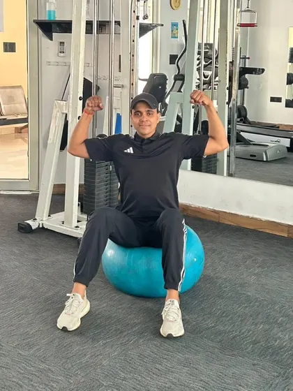 Flexing while seated.