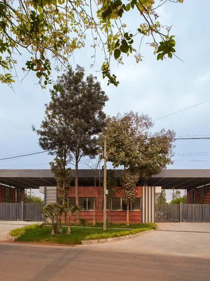 The 100-foot-wide East Entrance Gateway we designed for Campus Biovet in Malur. The new entrance was planned to be grand and inviting yet modest, housing vehicular and pedestrian access as well as a central security complex.