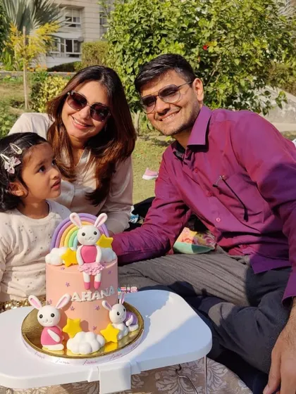 A beautiful family moment centered around a special cake. This bunny-themed cake was part of a lovely outdoor picnic, creating a sweet memory for years to come.