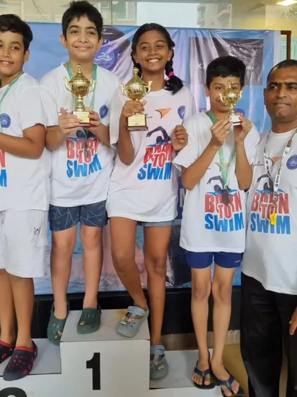 Our young champions on the podium after the Mumbai Swimming Challenge. Seeing them hold their trophies is the greatest reward for a coach. Their success is a direct result of their consistent effort in training.