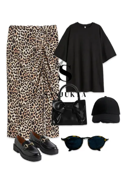 Leopard print is a huge trend, and this is such a cool way to wear it. I styled this ruched leopard skirt with a simple oversized black t-shirt and chunky loafers for an outfit that is the definition of effortless street style.