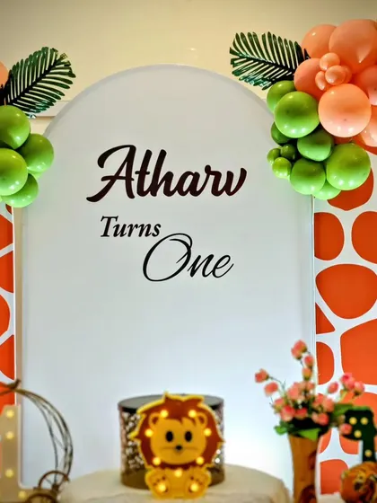 A detail shot of the "Atharv Turns One" backdrop.