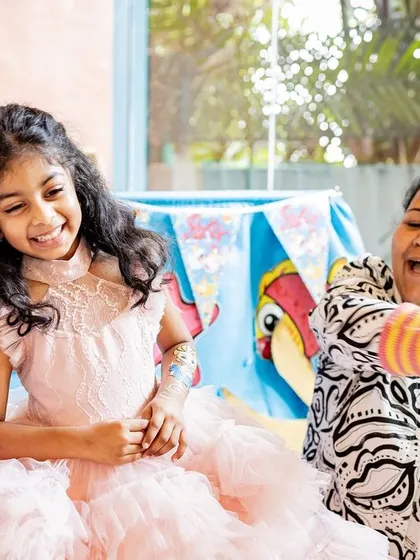 A puppet show was the highlight of this fifth birthday party. I love capturing the children's expressions of wonder and laughter during party entertainment. It adds another layer to the story of the day.