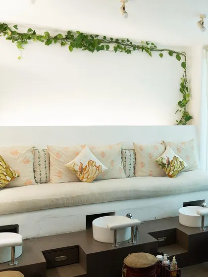 Welcome to your self-care sanctuary. Our pedicure station is designed for comfort and tranquility, surrounded by calming greenery. Here, you can unwind and let us take care of the rest.