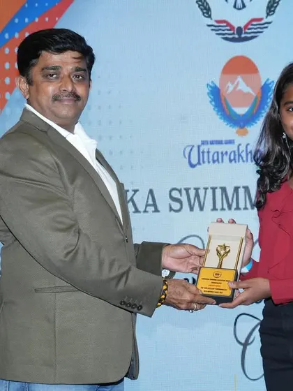 A symbol of dedication. Our water polo player being recognized for her excellence in the sport by the Karnataka Swimming Association.