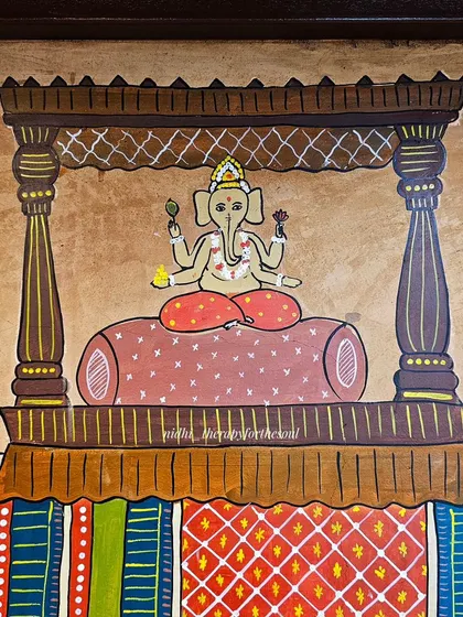 A close-up of Lord Ganesha seated atop the elephant. Even in smaller sections of a large mural, every detail is considered to bring the story to life.