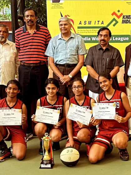 The U17 girls team posing with officials after their podium finish at the Khelo India 3x3 games.