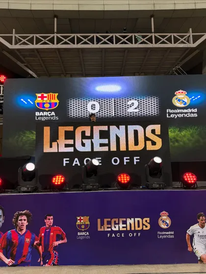 Peeking over the console at "The Sports Legends Face Off" event. Seeing the final score on the big screen while being the official DJ was an unreal experience.