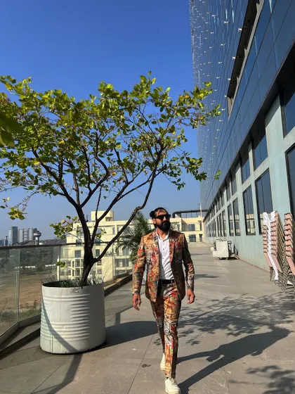 It's Carnival Day! Dressed in a custom printed suit, I'm ready to bring the energy and style to a fun, themed day party.