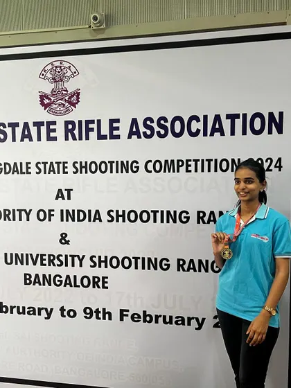 Bhashitha with her gold medal from the Air Rifle Women event at the Nagaraja Jagdale competition.