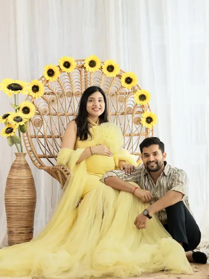 Your pregnancy photoshoot should be a reflection of your joy. We loved creating this bright and cheerful sunflower-themed setup for this happy couple in our studio.