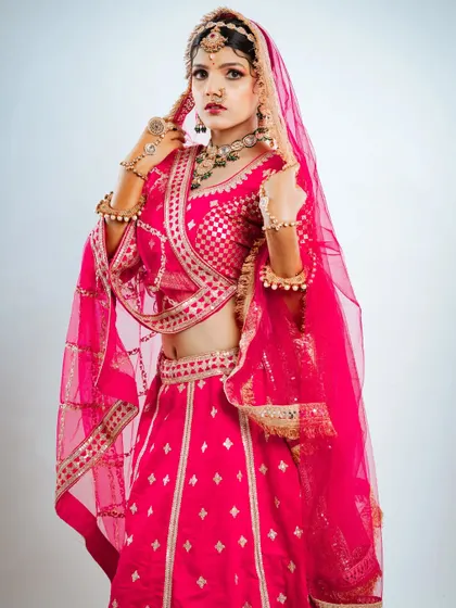 A full-length pose showcasing the confidence and grace this rental lehenga brings to the bride.