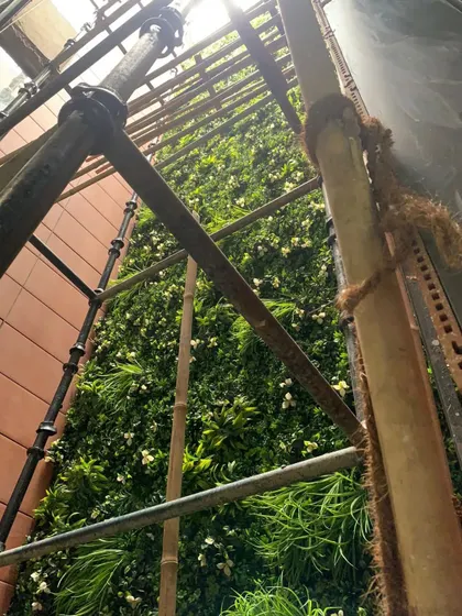 This project in Dwarka involved covering a large, unsightly building shaft with an artificial vertical garden. No space is too tricky; I have many ways to decorate your area with beautiful greenery.