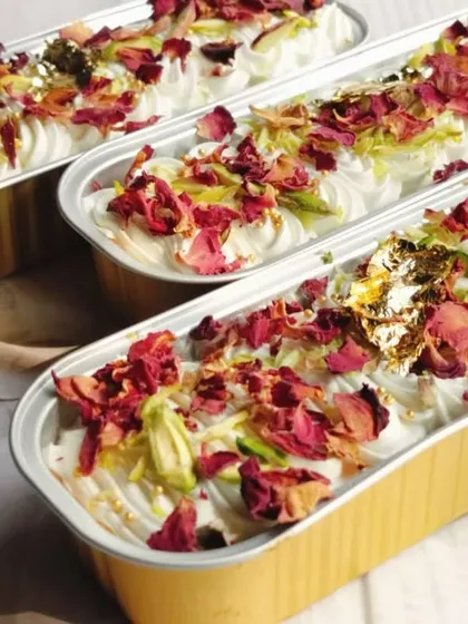 To celebrate Eid, I offer these stunning Rose and Pistachio Tres Leches Boats. The dessert combines delicate rose petals, crunchy pistachios, and creamy tres leches, finished with edible gold leaf for a touch of luxury.