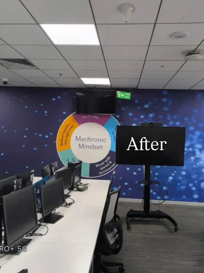 An 'after' shot of a corporate office project for Medtronic. I installed branded wall murals to transform a plain white office into a vibrant and motivational workspace.