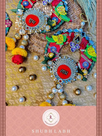 A detailed close-up of the 'Laabh' hanging from our parrot-themed set, showcasing the fine craftsmanship and colorful elements.