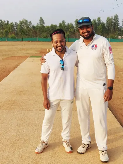 Two players share a moment of camaraderie during the BCA Super League knockout match. Team spirit is at the heart of our success.