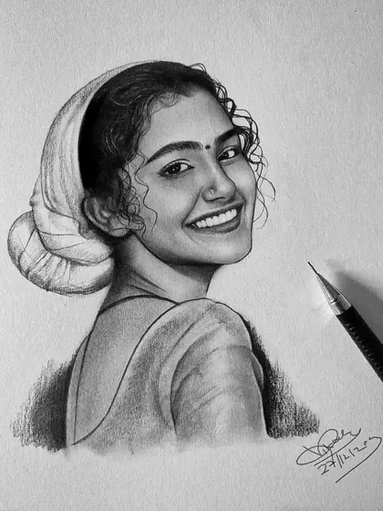 A pencil drawing of actress Anupama Parameswaran. Her bright smile and the curls of her hair were the main focus of this particular artwork.