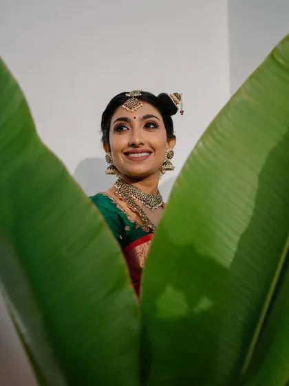 The epitome of South Indian elegance. This bride looks absolutely radiant, and we used natural elements to frame her beauty in a serene and artistic way.