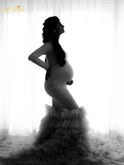 Another angle from this beautiful silhouette session. The high-contrast black and white effect creates a dramatic and artistic feel.