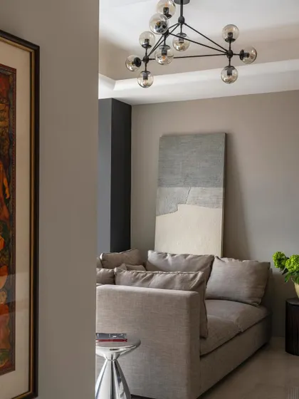 The media room at Apartment 1600, a comfortable and stylish space designed for relaxation and entertainment.