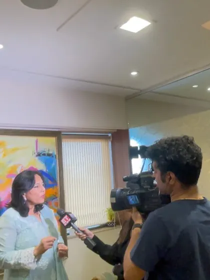 In my office, giving an interview about a recent Bombay High Court decision. It's important to analyze and share insights on such rulings.
