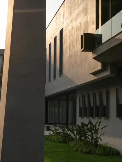 Various exterior perspectives that capture the dynamic geometry and the dance of light and shadow across the concrete surfaces throughout the day.