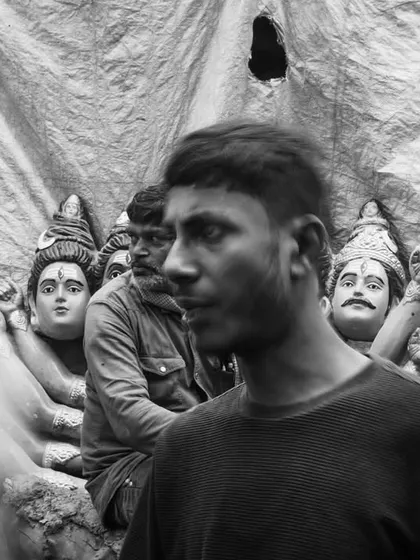 A black and white photo series from Masaan Holi. These images strip away color to focus on the raw emotion, the crowds, and the stark spiritual power of this unique festival.