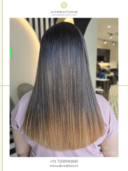 The back view of our blonde ombre with a Samba treatment, showing the flawless gradient and glossy finish.